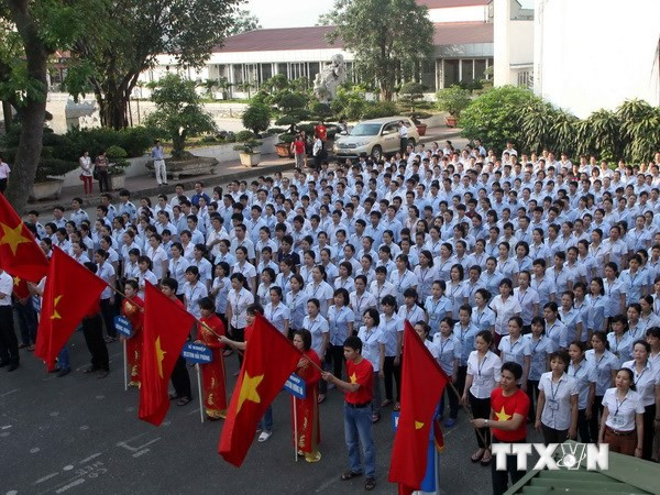 Công nhân tại một doanh nghiệp míttinh phản đối Trung Quốc hạ đặt giàn khoan trái phép trong vùng biển Việt Nam. (Nguồn: TTXVN) Thủ tướng chỉ thị kiên quyết không để xảy ra những vụ kích động ảnh 1