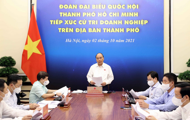 Chủ tịch nước Nguyễn Xuân Phúc tiếp xúc cử tri doanh nghiệp TP.HCM ảnh 1