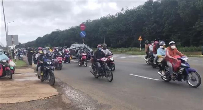 Đồng Nai, Cà Mau tạo điều kiện thuận lợi cho người dân về quê ảnh 1