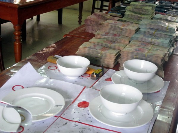 Ảnh chỉ có tính minh họa. (Ảnh: Văn Đạt/TTXVN) Công an thành phố Hà Nội liên tiếp triệt xóa các ổ nhóm đánh bạc ảnh 1