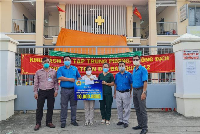 Đoàn kết phòng, chống dịch COVID-19: Ấm lòng giữa đại dịch ảnh 1