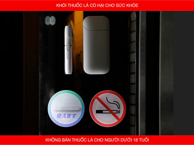 Một nhà hàng tại Nhật Bản để biển báo cấm thuốc lá điếu nhưng cho phép thuốc lá làm nóng. (Nguồn: Reuters) thuoc la lam nong 3.png