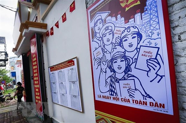 Tuyên truyền về bầu cử. (Nguồn: TTXVN) Tiền Giang: Chú trọng tuyên truyền về bầu cử cho đồng bào Công giáo ảnh 1