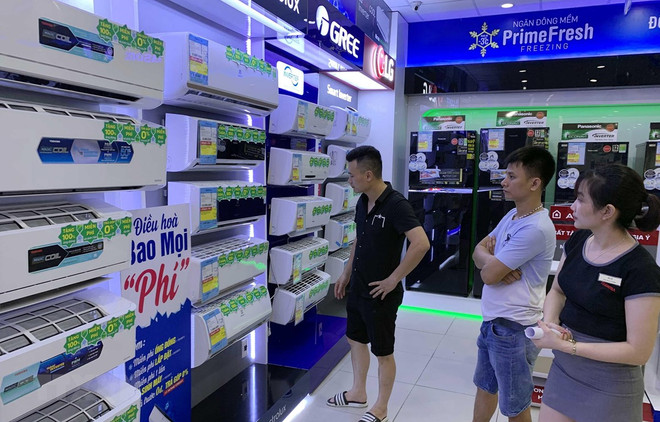 Ảnh minh họa. (Nguồn: TTXVN) Sức mua hàng điện máy tại TP.HCM chưa 'tăng nhiệt' trong mùa nóng ảnh 1