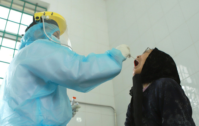 [Photo] Những chiến sỹ nơi tuyến đầu chống dịch COVID-19 ở Bình Xuyên ảnh 18