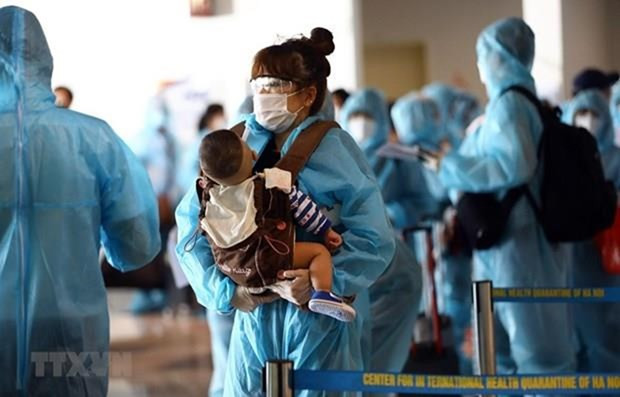 Bé trai 7 tháng tuổi mắc COVID-19 được chuyển đến Bệnh viện Nhi đồng ảnh 1