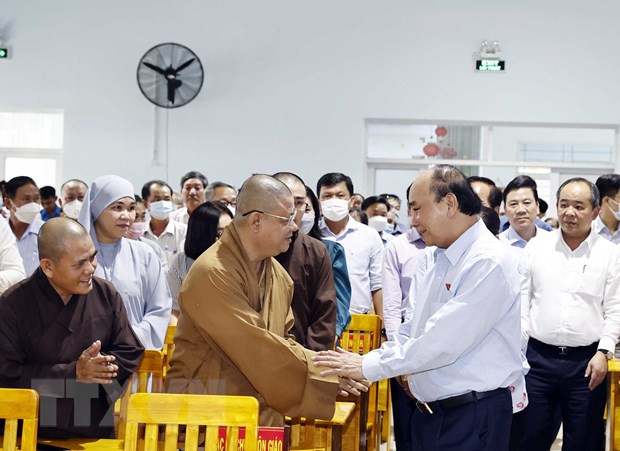 Chủ tịch nước Nguyễn Xuân Phúc tiếp xúc cử tri huyện Hóc Môn, TP.HCM. (Ảnh: Thống Nhất/TTXVN) Nhiều ý kiến của cử tri gửi tới Kỳ họp thứ 4 Quốc hội khóa XV ảnh 2