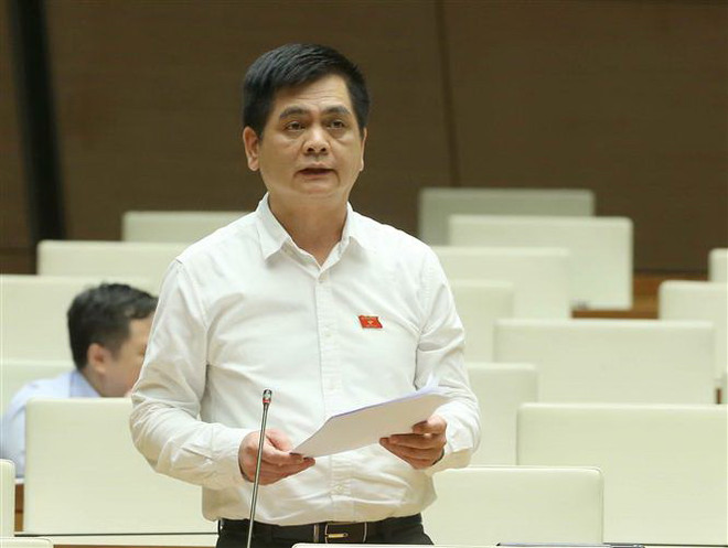 Đại biểu Quốc hội tỉnh Lạng Sơn Nguyễn Lâm Thành phát biểu ý kiến. (Ảnh: Doãn Tấn/TTXVN) Họp Quốc hội: Nhiều ý kiến khác nhau về dịch vụ kinh doanh đòi nợ ảnh 1