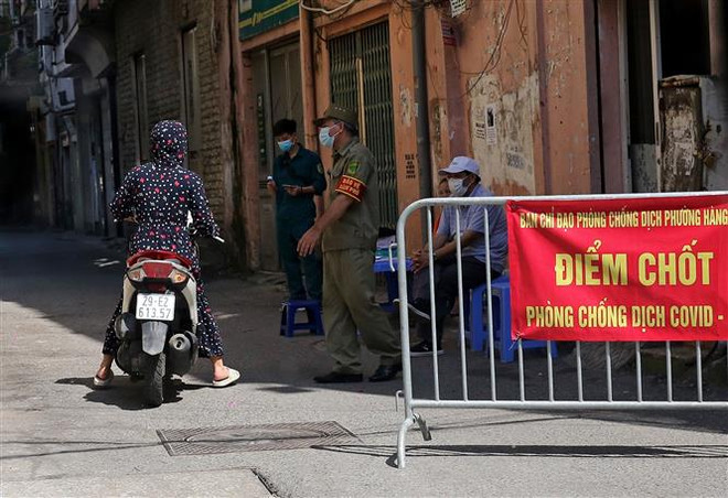 Hà Nội tăng cường tuần tra, xử phạt vi phạm quy định phòng chống dịch ảnh 1
