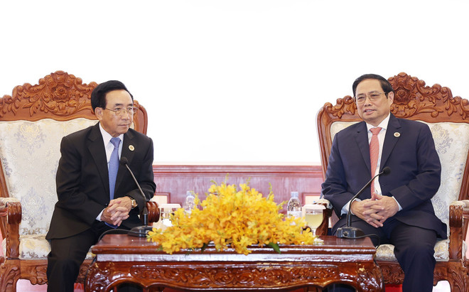 Thủ tướng Phạm Minh Chính và Thủ tướng Lào Phankham Viphavanh. (Ảnh: Dương Giang/TTXVN) Thủ tướng Phạm Minh Chính gặp Thủ tướng Lào Phankham Viphavanh ảnh 2