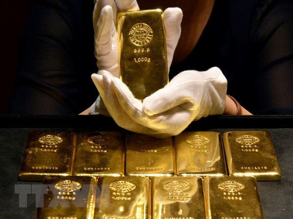 Giá vàng thế giới chạm mức cao nhất trong vòng một tháng ảnh 1
