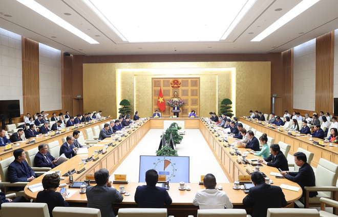 Quang cảnh buổi gặp. (Ảnh: Dương Giang/TTXVN) Thủ tướng: Nhà nước khuyến khích các doanh nghiệp làm giàu chính đáng ảnh 1