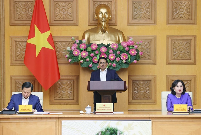 Thủ tướng Phạm Minh Chính và Phó Thủ tướng Lê Minh Khái chủ trì buổi gặp mặt của Thủ tướng Chính phủ với các chủ tịch, tổng giám đốc các ngân hàng thương mại. (Ảnh: Dương Giang/TTXVN) Thủ tướng: Nhà nước khuyến khích các doanh nghiệp làm giàu chính đáng ảnh 3