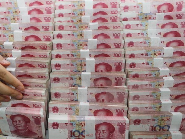 Đồng nhân dân tệ của Trung Quốc. (Nguồn: EPA/TTXVN) Tỷ giá đồng nhân dân tệ ở mức thấp kỷ lục trong hơn 6 năm qua ảnh 1