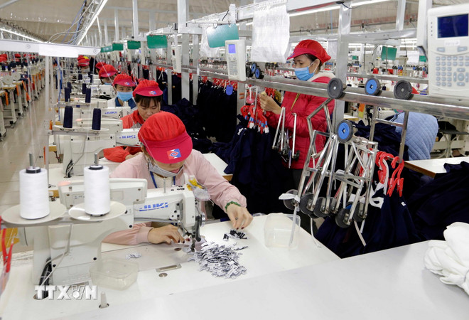 Năm nhiệm vụ, giải pháp trọng tâm để bảo đảm tăng trưởng đạt 8,3-8,5% ttxvn-det-may-5353.jpg