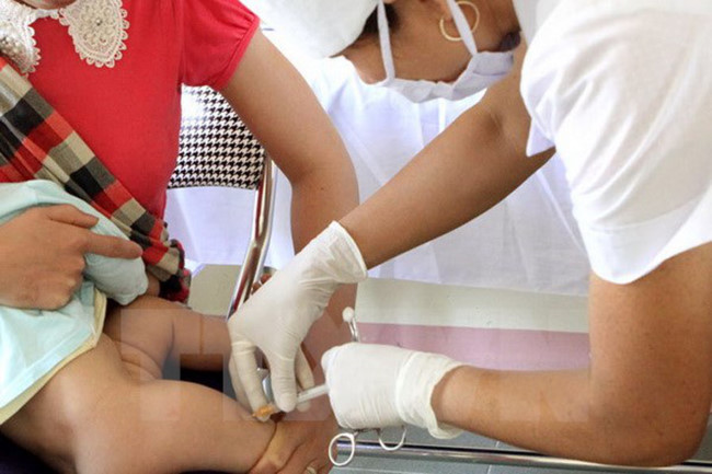 Ảnh minh họa. (Nguồn: TTXVN) UNICEF và WHO: Cần khôi phục hoạt động của chương trình tiêm chủng ảnh 1