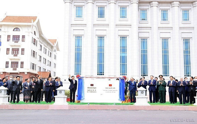 Chủ tịch nước: Quan hệ Việt-Lào sẽ tiếp tục nở hoa thơm, kết trái ngọt ảnh 4