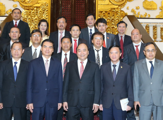 Thủ tướng tiếp Bộ trưởng Lào và Chủ tịch Tập đoàn JA Solar ảnh 1