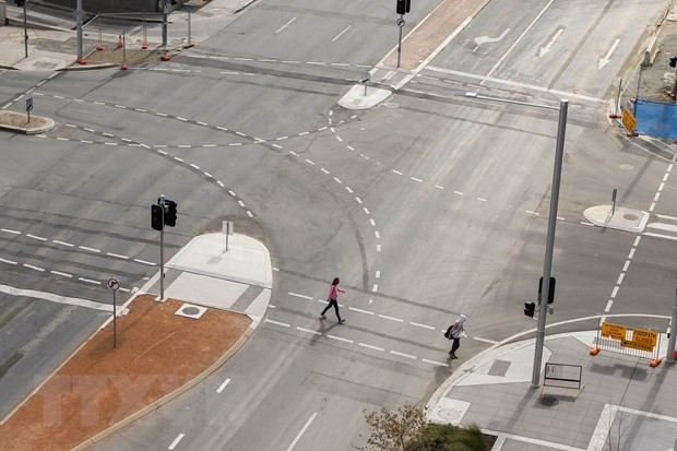 Australia nới lỏng một số hạn chế sau khi tỷ lệ tiêm chủng đạt 70% ảnh 1