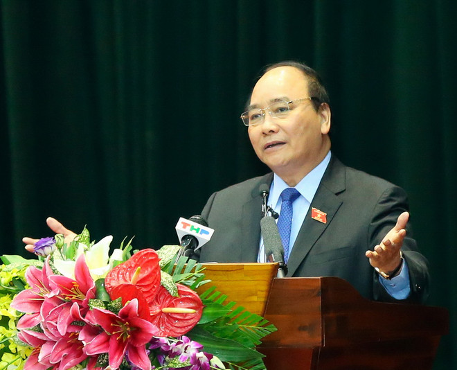Thủ tướng Nguyễn Xuân Phúc phát biểu. (Ảnh: Thống Nhất/TTXVN) Thủ tướng giải đáp về TPP, ông Vũ Huy Hoàng với cử tri Hải Phòng ảnh 2