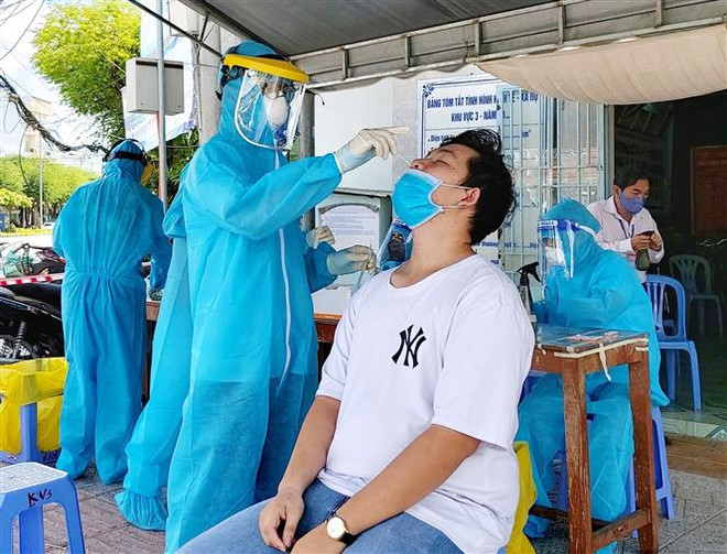 Việt Nam ghi nhận 12.096 ca mắc mới COVID-19 và thêm 335 ca tử vong ảnh 1