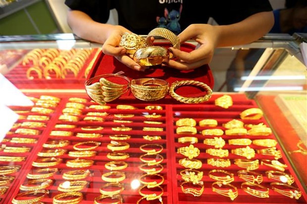 Ảnh minh họa (Nguồn: AFP/TTXVN) Giá vàng đi lên tại thị trường châu Á trong phiên ngày 13/1 ảnh 1