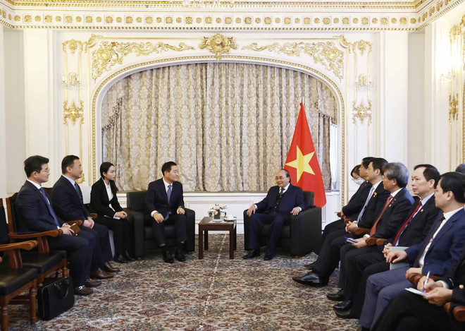 Chủ tịch nước Nguyễn Xuân Phúc tiếp lãnh đạo Samsung Electronics ảnh 1