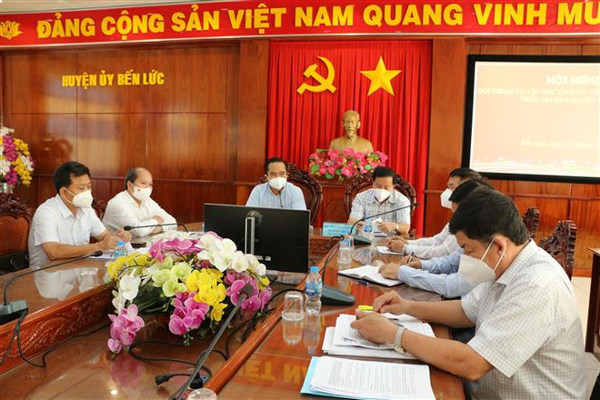 Cơ bản khống chế dịch bệnh, Long An bắt tay vào khôi phục kinh tế ảnh 1