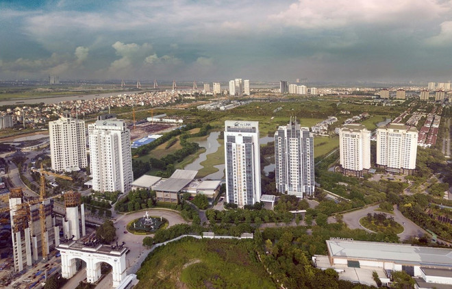 Thị trường bất động sản nhiều nơi 'hạ nhiệt' nhưng giá vẫn cao ảnh 1