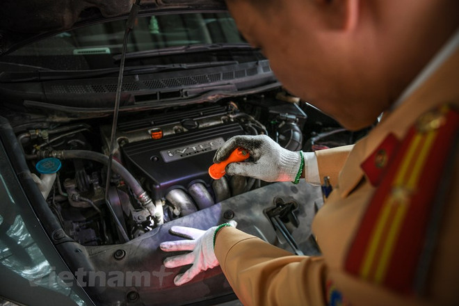 Cảnh sát giao thông hỗ trợ đăng kiểm gần 158.300 lượt phương tiện ảnh 1
