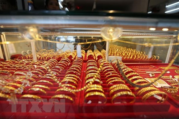 Giá vàng châu Á phiên 23/2 tăng lên mức cao nhất của một tuần ảnh 1