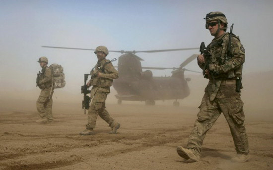 Binh sỹ Mỹ ở Afghanistan. (Nguồn: AP) Thủ lĩnh Taliban cảnh báo Mỹ về việc tăng quân ở Afghanistan ảnh 1