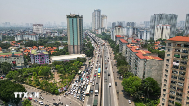 Một góc Hà Nội. (Nguồn: TTXVN) ttxvn-giao-thong-ha-noi-1-1096.jpg