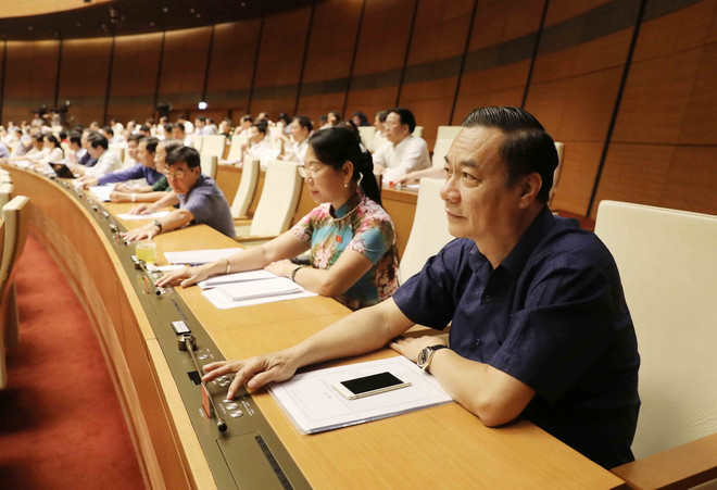 Quốc hội biểu quyết thông qua dự thảo Luật Đo đạc và bản đồ ảnh 1