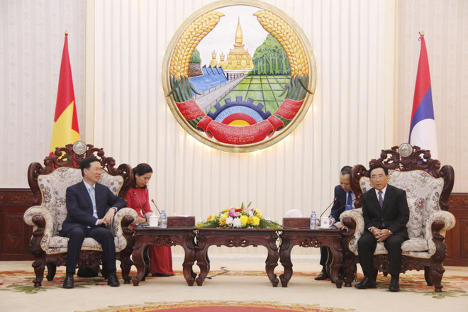 Thủ tướng Chính phủ Lào Phankham Viphavanh tiếp ông Võ Văn Thưởng, Ủy viên Bộ Chính trị, Thường trực Ban Bí thư. (Ảnh: Phạm Kiên/TTXVN) Thường trực Ban Bí thư Võ Văn Thưởng thăm và làm việc tại Lào ảnh 2