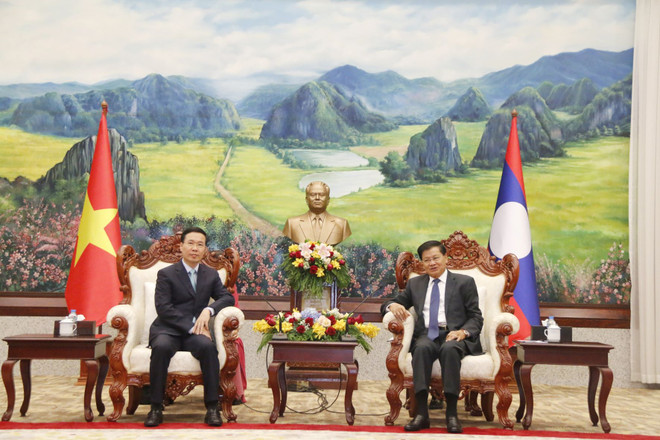 Tổng Bí thư, Chủ tịch nước Lào Thongloun Sisoulith tiếp ông Võ Văn Thưởng, Ủy viên Bộ Chính trị, Thường trực Ban Bí thư. (Ảnh: Phạm Kiên/TTXVN) Thường trực Ban Bí thư Võ Văn Thưởng thăm và làm việc tại Lào ảnh 1