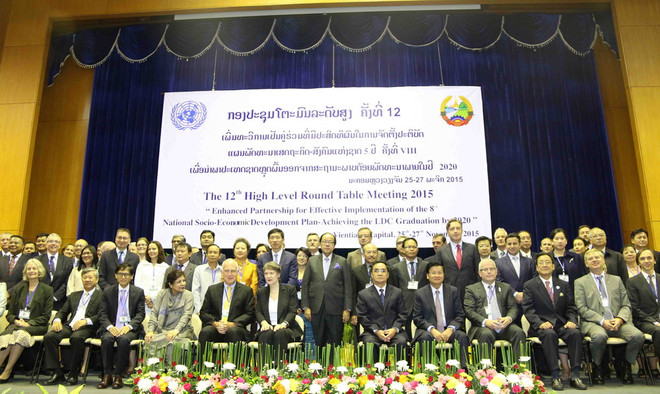 Hội nghị bàn tròn cấp cao về phát triển kinh tế xã hội tại Lào ảnh 1