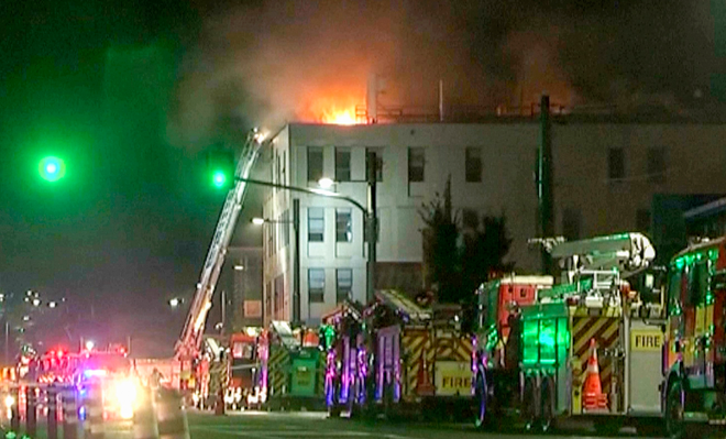 Cảnh sát New Zealand nỗ lực tiếp cận tòa nhà bị cháy ở Wellington ảnh 1