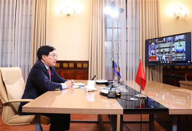 Phó Thủ tướng, Bộ trưởng Bộ Ngoại giao Phạm Bình Minh phát biểu tại Hội nghị trực tuyến đặc biệt cấp Bộ trưởng Ngoại giao ASEAN-Hoa Kỳ về ứng phó dịch bệnh COVID-19. (Ảnh: Lâm Khánh/TTXVN) ASEAN hợp tác với Hoa Kỳ tìm biện pháp ứng phó với dịch COVID-19 ảnh 2