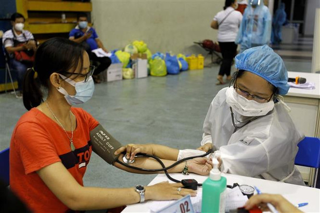 Chiến dịch tiêm vaccine COVID-19 ở TP Hồ Chí Minh: Phối hợp tổng lực ảnh 1