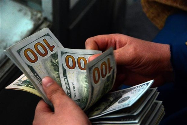Ảnh minh họa (Nguồn: AFP/TTXVN) Financial Times: Chu kỳ thắt chặt tiền tệ toàn cầu “khởi động” ảnh 1