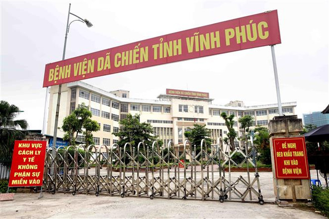 Bệnh viện dã chiến tỉnh Vĩnh Phúc ở xã Định Trung, thành phố Vĩnh Yên được kích hoạt từ 18 giờ ngày 7/5. (Ảnh: Hoàng Hùng/TTXVN) Kích hoạt lại Bệnh viện dã chiến tỉnh Vĩnh Phúc để phòng, chống dịch ảnh 1