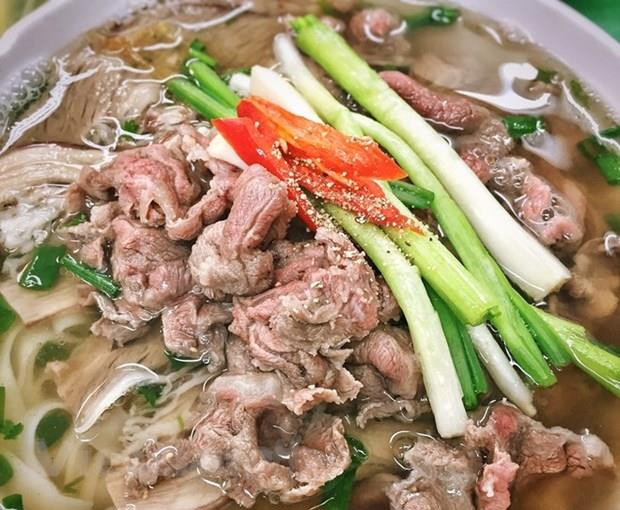 Món phở bò trứ danh của Hà Nội. (Ảnh: CTV/Vietnam+) Người giữ hồn cốt ẩm thực Hà Nội nấu Quốc yến tiếp ông Kim Jong-un ảnh 4