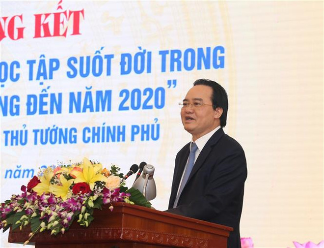 Bộ trưởng Bộ Giáo dục và Đào tạo Phùng Xuân Nhạ phát biểu tại Hội nghị. (Ảnh: Hoàng Hiếu/TTXVN) 'Xây dựng xã hội học tập là trách nhiệm của cả hệ thống chính trị' ảnh 2