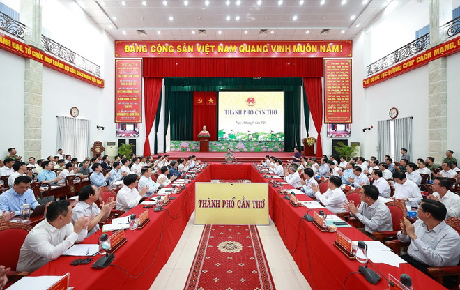 Quang cảnh cuộc họp. (Ảnh: Dương Giang/TTXVN) Thủ tướng: 'Cao tốc có sớm ngày nào, ĐBSCL hưởng lợi ngày đó' ảnh 2