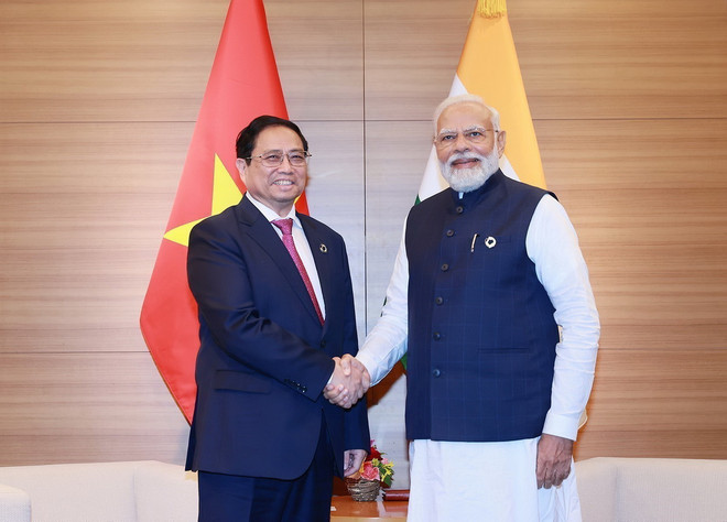 Thủ tướng Phạm Minh Chính gặp Thủ tướng Ấn Độ Narendra Modi tại Hội nghị thượng đỉnh Nhóm các nước công nghiệp phát triển (G7) mở rộng ở Hiroshima, Nhật Bản (20/5/2023). (Ảnh: Dương Giang/TTXVN) ttxvn_thu tuong vietnam_an do.jpg