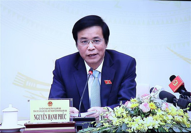 Tổng Thư ký, Chủ nhiệm Văn phòng Quốc hội Nguyễn Hạnh Phúc chủ trì họp báo. (Ảnh: Trọng Đức/TTXVN) Tiếp tục đổi mới để nâng cao hiệu quả hoạt động của Quốc hội ảnh 2