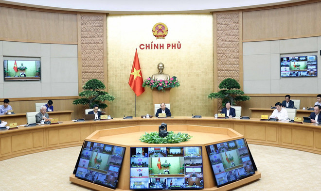 Thủ tướng Nguyễn Xuân Phúc phát biểu. (Ảnh: Thống Nhất/TTXVN) Thủ tướng: Quản lý y tế chặt chẽ người nhập cảnh vào Việt Nam ảnh 2
