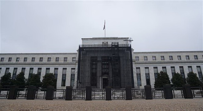 Quang cảnh bên ngoài Cục Dự trữ liên bang Mỹ (Fed) tại Washington DC. (Ảnh: THX/TTXVN) Nhiều gói hỗ trợ tài chính giúp các nền kinh tế vượt qua khủng hoảng ảnh 1