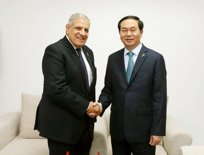 Chủ tịch nước Trần Đại Quang tiếp Trưởng đoàn Ai Cập Ibrahim Mahlab. (Ảnh: Nhan Sáng/TTXVN) Chủ tịch nước tiếp xúc song phương nguyên thủ, trưởng đoàn các nước ảnh 1